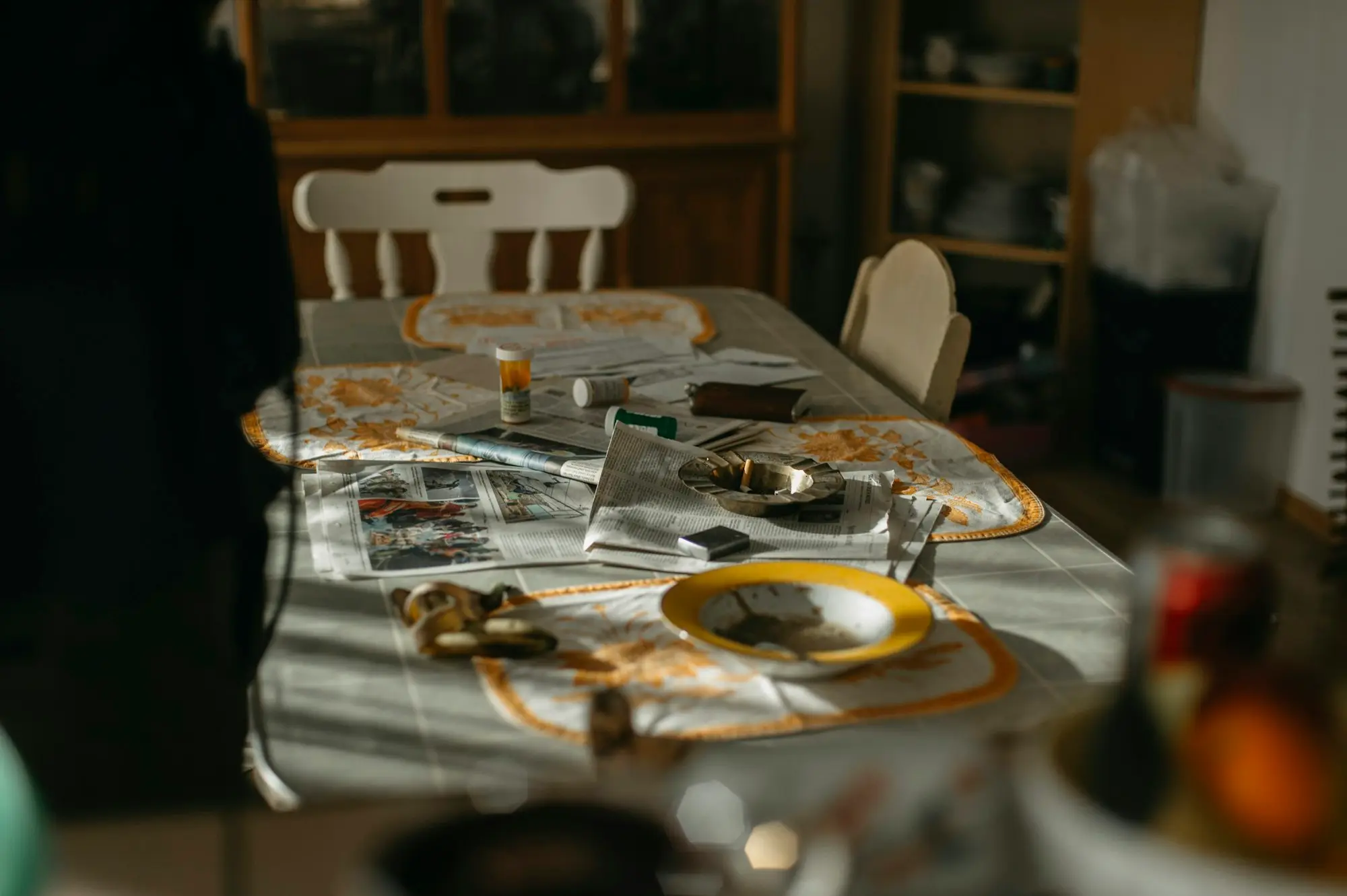 Grant paperwork spread across a kitchen table